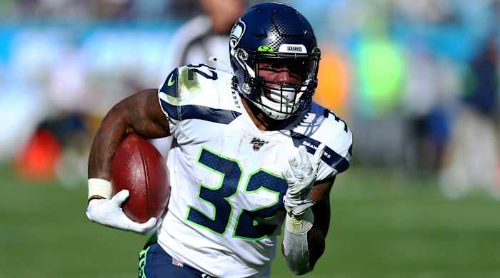 Dec 15, 2019; Charlotte, NC, USA; Seattle Seahawks running back Chris Carson (32) carries the ball during the first quarter against the Carolina Panthers at Bank of America Stadium. Mandatory Credit: Jeremy Brevard-USA TODAY Sports